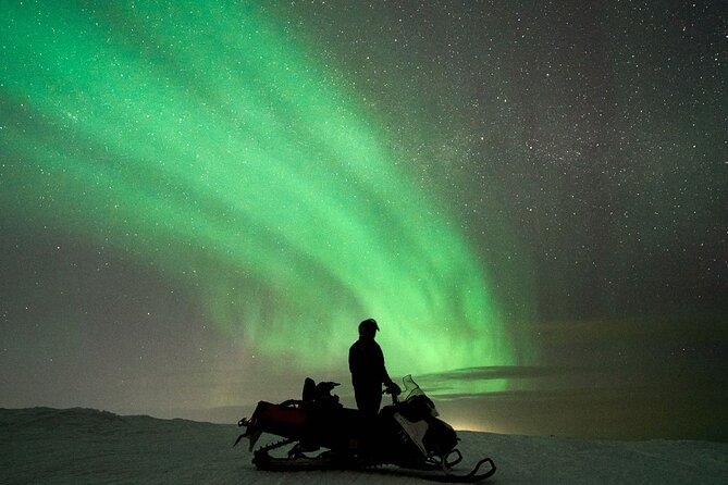 3 Hours Snowmobiling under Auroras and Night Sky - The tipi stop and campfire supper