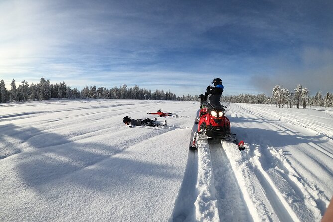 3H Private Snowmobile Experience in Rovaniemi's Forest - Getting dressed for the Arctic