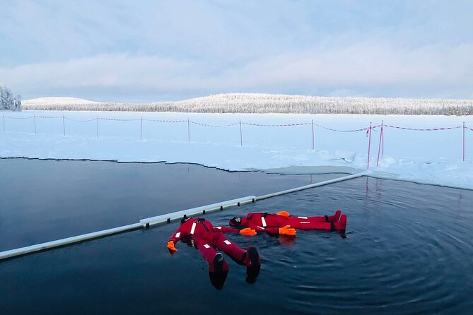 Arctic Day with Ice Fishing and Floating - Ice floating requires trust in the suit and careful preparation