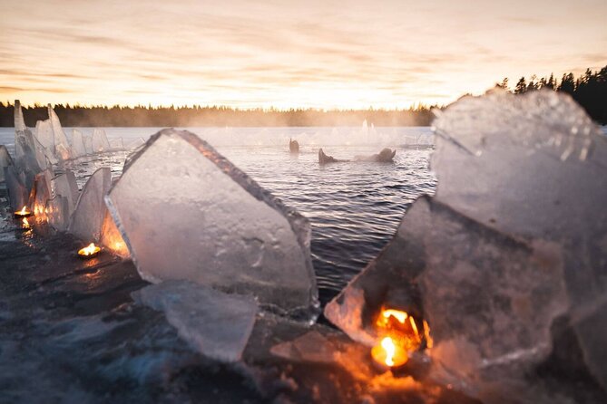 Aurora Arctic Ice Floating in Rovaniemi, Small-group - Campfire, blueberry drinks, and a warm cabin