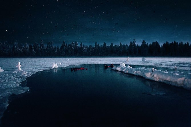 Aurora Ice Floating in Rovaniemi - Getting into the special dry suit