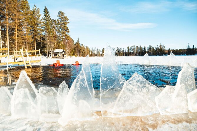 Daytime Arctic Ice-Floating in Rovaniemi, Small-Group - Entering the icy lake without needing to swim