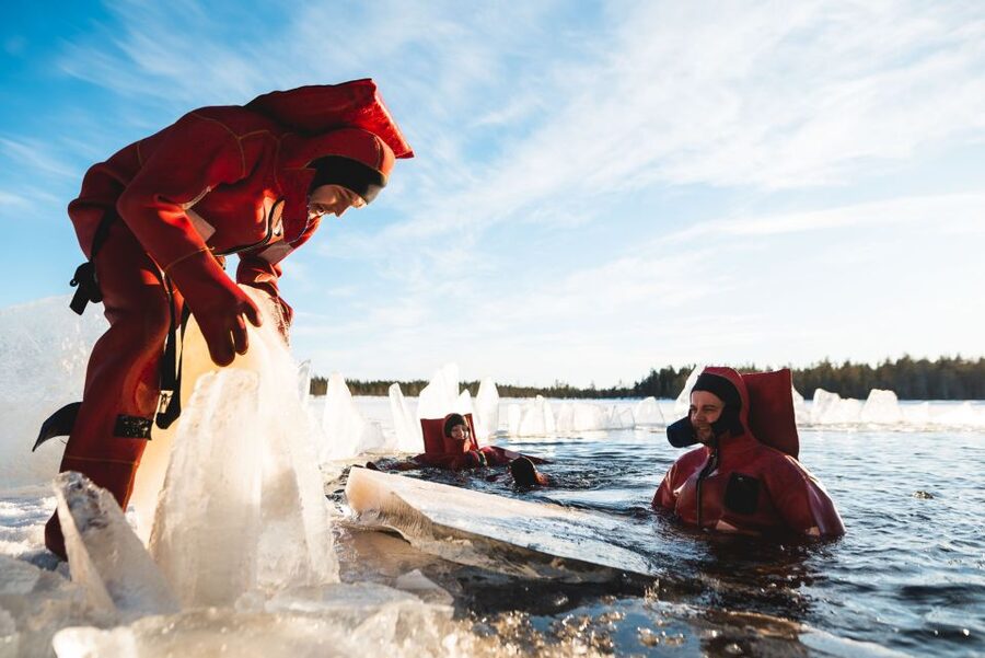 Daytime Ice Floating Rovaniemi, Frozen Lake Experience - Getting fitted for the rescue suit