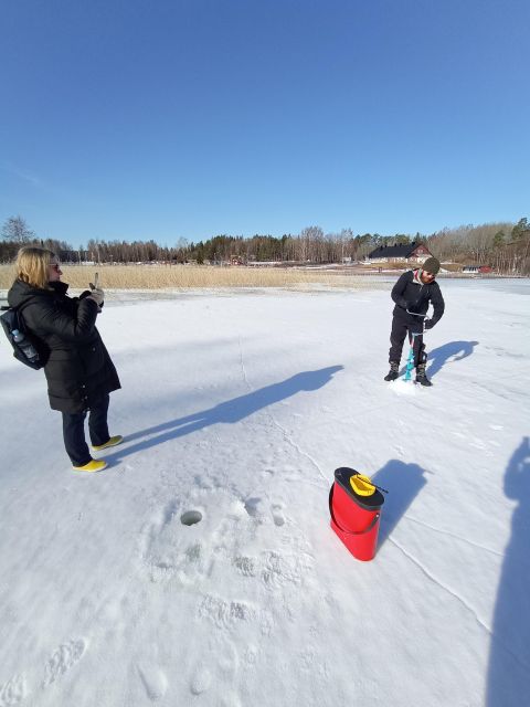 From Helsinki: Bodom Lake Ice Fishing with Food & Drinks - The laavu fire and Finnish comfort food