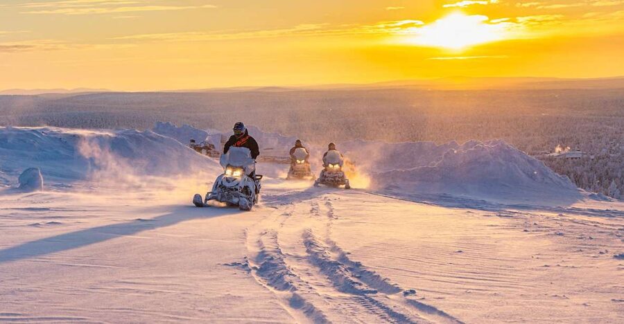 From Rovaniemi: Guided Lapland Snowmobile Adventure - Getting suited up for Arctic temperatures