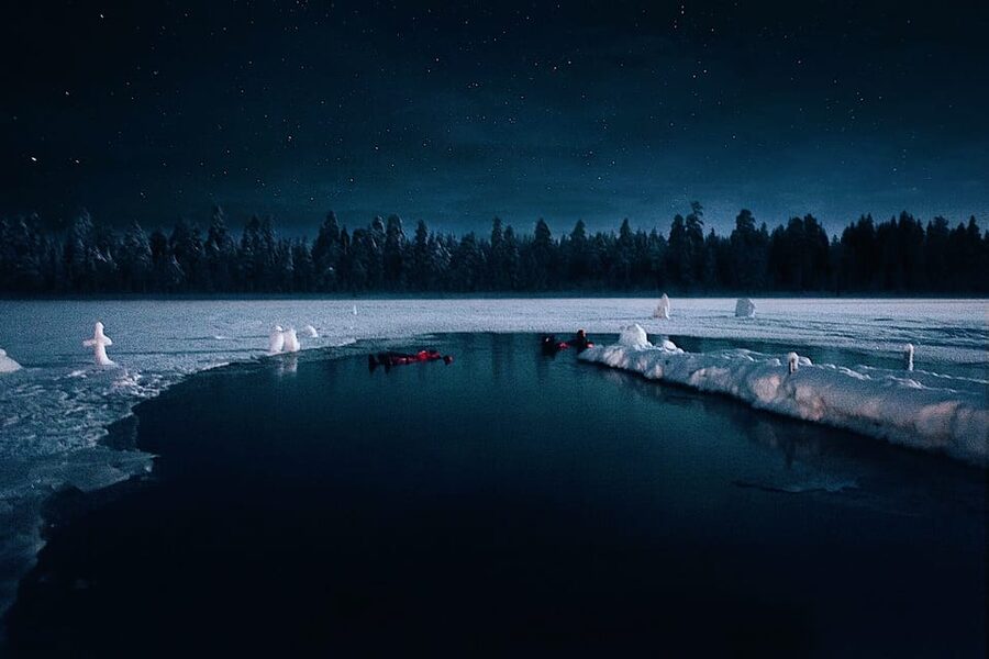 From Rovaniemi: Ice Floating under Aurora Borealis - Getting ready in winter clothing and a rescue suit