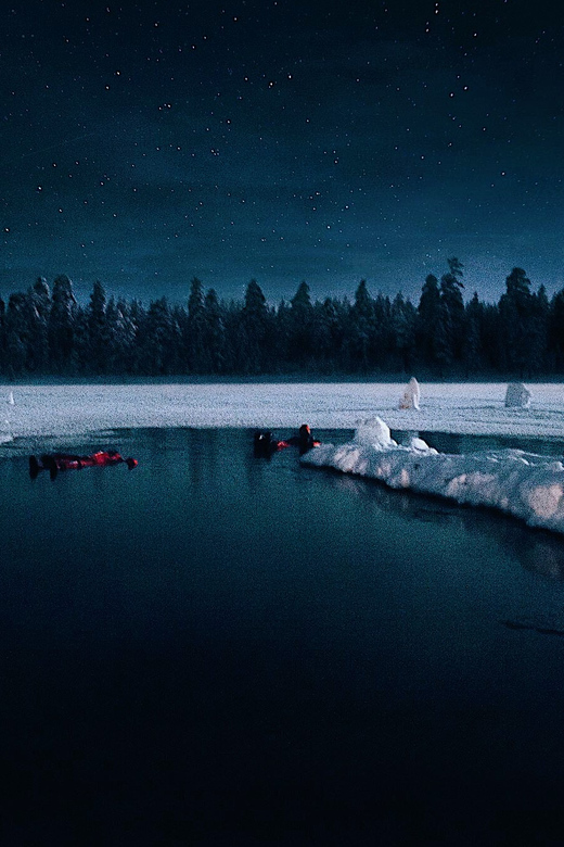 From Rovaniemi: Ice Floating under Aurora Borealis - The guides make the strange part feel easy