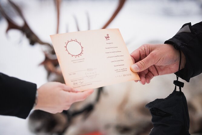 Husky and Reindeer Experience With Snowmobiling - Getting dressed for temperatures below freezing