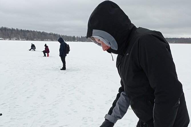 Ice fishing experience with Backpacker Helsinki Tour - Meeting at Museokatu 8 in central Helsinki