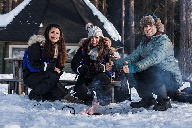 Ice Fishing Tour - A teepee, hot drinks, and food by the fire