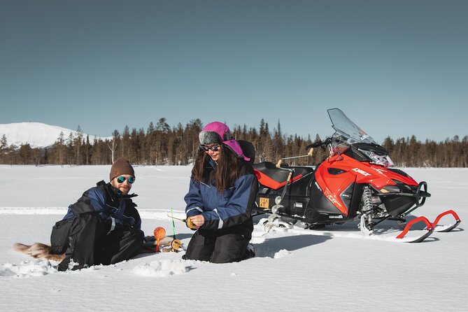 Lappish Lunch Break -Snowmobiling, ice fishing and tasty food - Leaving Safartica for the frozen north