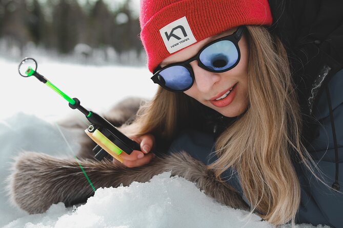 Lappish Lunch Break -Snowmobiling, ice fishing and tasty food - Learning to handle a snowmobile