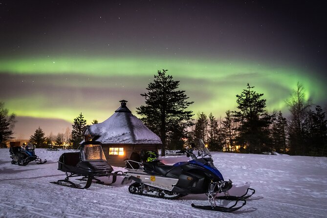 Levi Northern lights by snowmobile - Searching from dark clearings and frozen fields