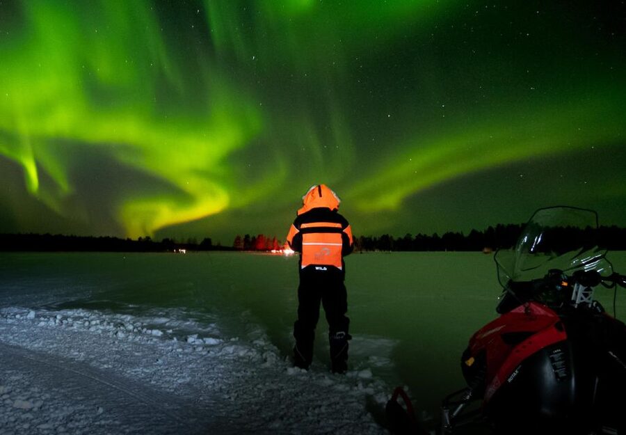 Levi: Northern Lights Snowmobile Tour with Snacks and Drinks - The forest stop, sausages, and hot juice