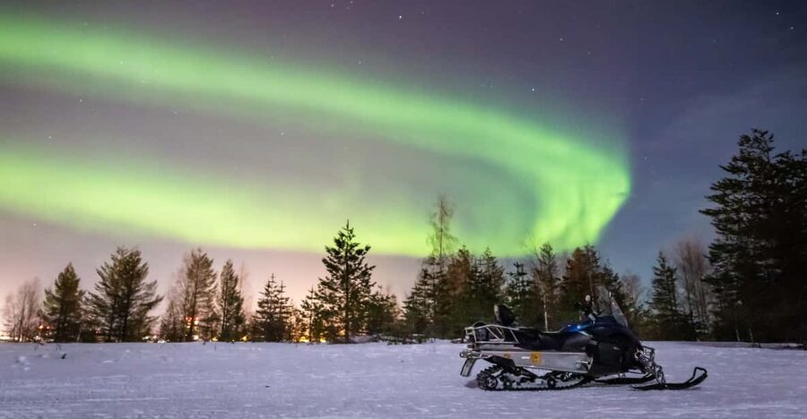 Levi: Snowmobile Northern Lights Hunting Trip - Riding into Levi’s dark winter forest
