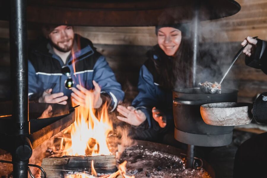 Levi: Snowmobile Safari with Ice Fishing and Outdoor Lunch - Learning the practical art of ice fishing