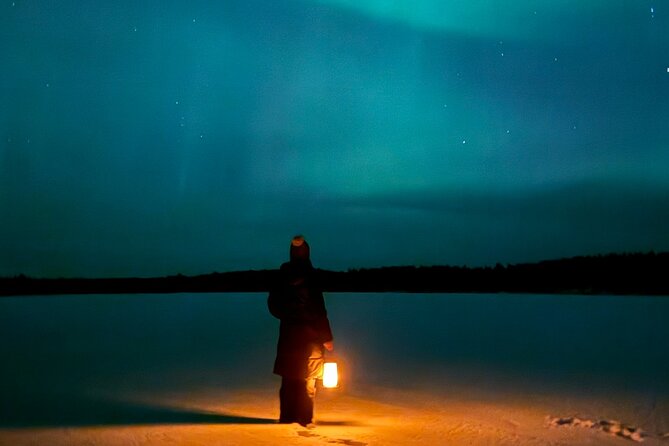 Northern Lights Adventure in the Wild with Campfire Treats - Watching the sky from reindeer hides
