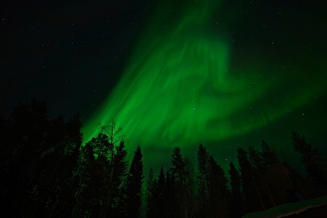 Northern Lights Hunting in Lappish old cottage - Guides, stories, and the science of auroras