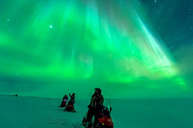 Northern Lights Snowmobile Safari from Rovaniemi with Campfire Picnic - Makkara, hot drinks, and the campfire stop
