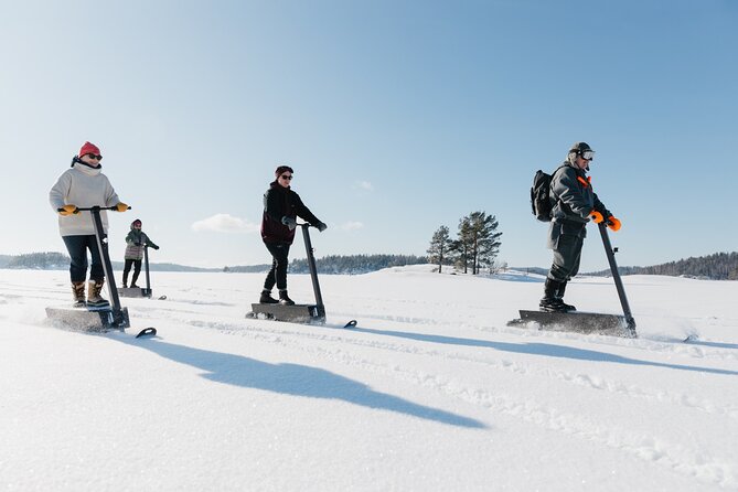 Private Driving Snow Scooters Experience in Finland - Learning the eLyly in the practice area