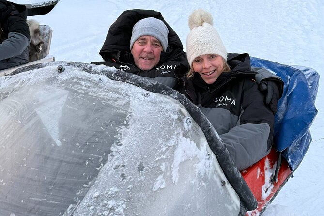 Reindeer Husbandry with Snowmobile Sleigh Ride and Cabin Lunch - The snowmobile sleigh ride across frozen water