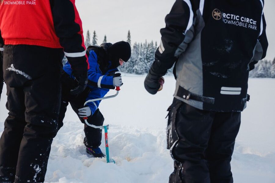 Rovaniemi: Arctic Circle Ice Fishing Experience - The campfire break with sausages and hot juice