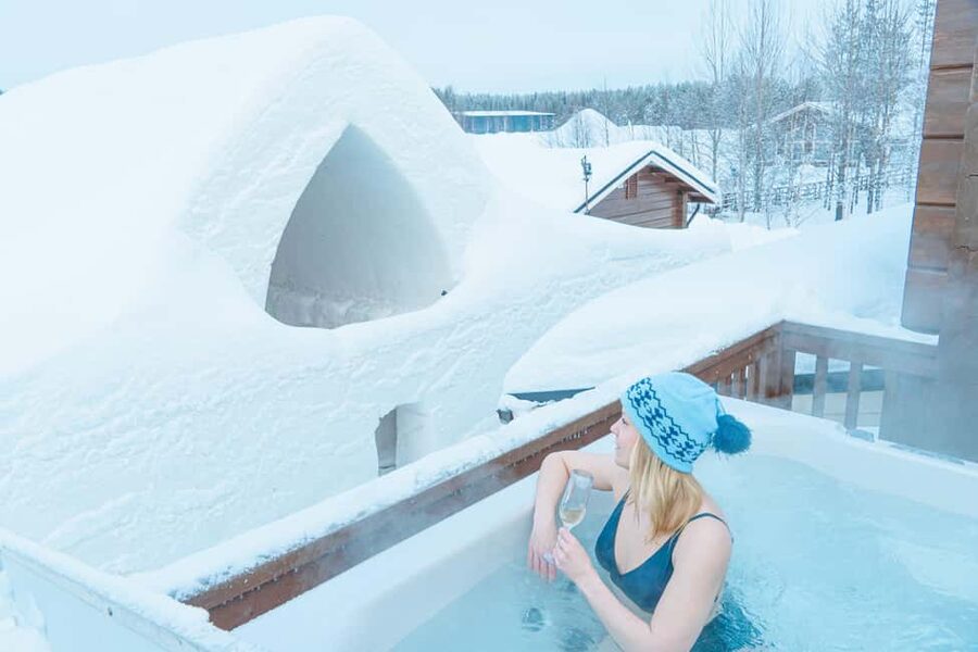 Rovaniemi: Arctic Snow Hotel Tour and Snow Sauna Experience - Entering the Arctic SnowHotel near Rovaniemi