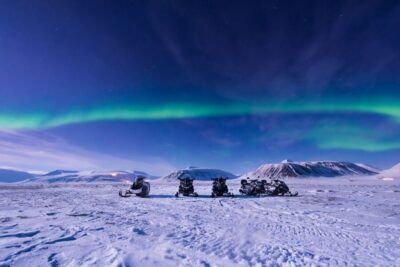 Aurora Borealis Snowmobile Safari with Campfire