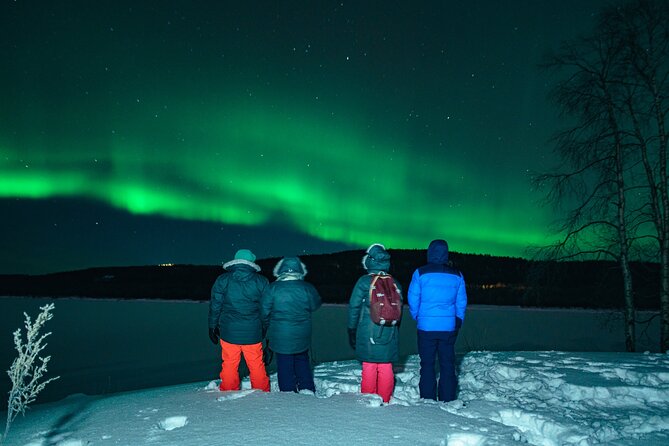 Rovaniemi: Aurora Hunt with Photograph & money back guarantee - Waiting outside, then warming up