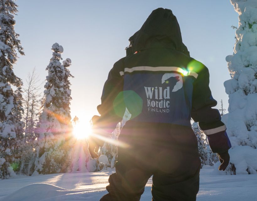 Rovaniemi: Family Snowmobile Safari with Campfire and Snacks - Adults on the forest trail