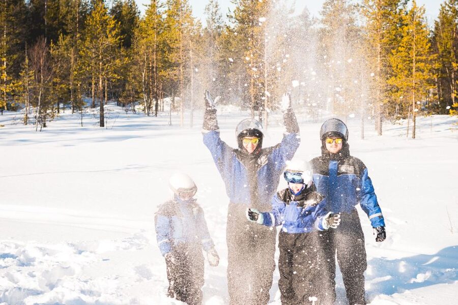 Rovaniemi: Family Snowmobile Safari with Campfire and Snacks - Sausages, marshmallows, and berry juice by the fire