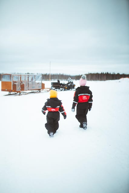 Rovaniemi: Family Snowmobiling Trip - The adult snowmobile ride through Lapland