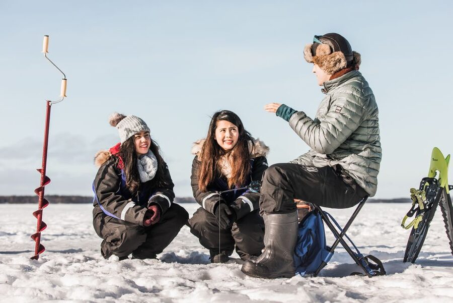 Rovaniemi: Ice Fishing Experience - Walking from forest to frozen lake