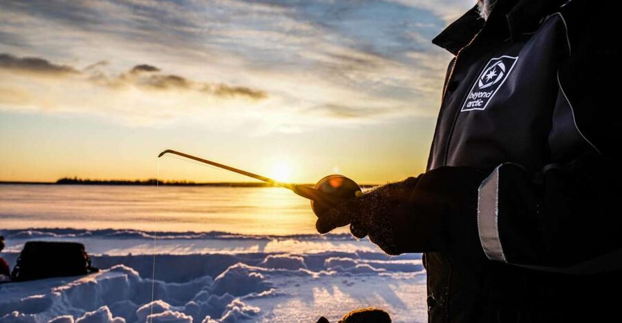 Rovaniemi: Ice Fishing on a Frozen Lake with BBQ and Photos - Two and a half hours beside the lake