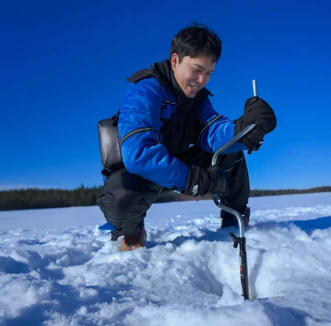 Rovaniemi: Ice Fishing Small Group Tour & Barbeque - Learning to drill through the ice