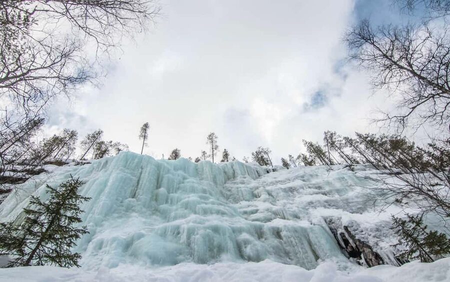 Rovaniemi: Korouoma Canyon and Frozen Waterfalls Tour - Hiking through cliffs, rapids, and snow