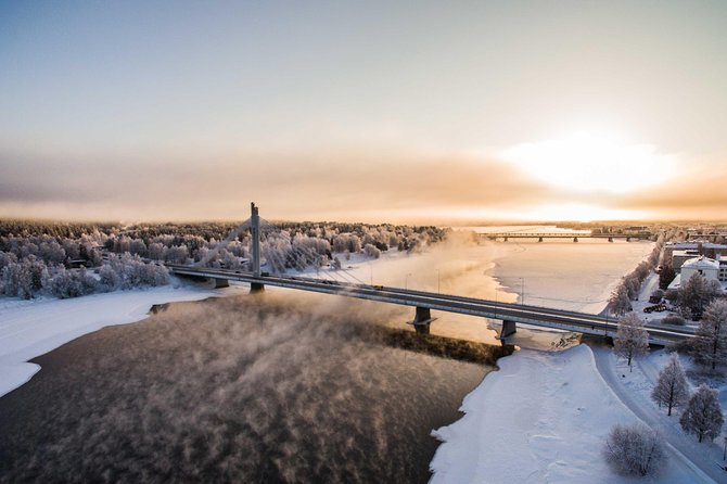 Rovaniemi photography tour - Arktikum and the frozen river backdrop