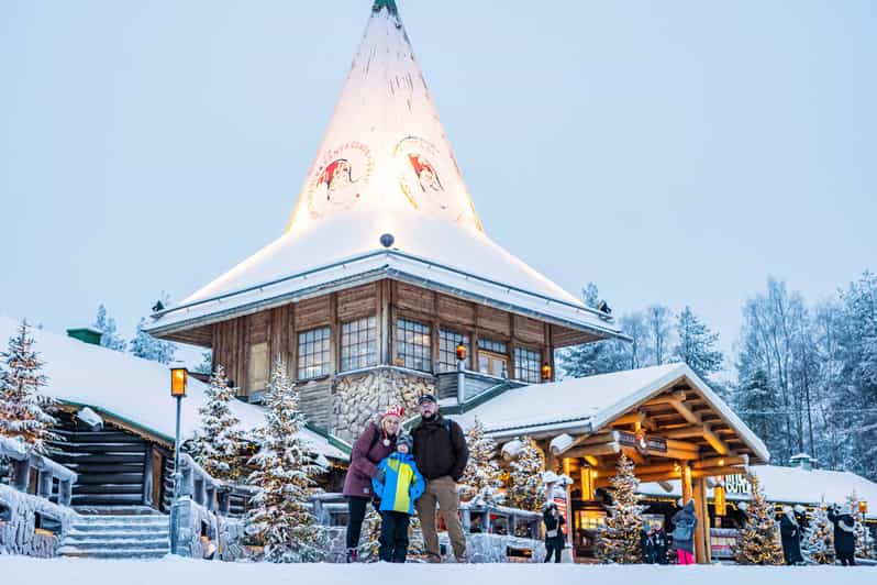 Rovaniemi: Private Pro Photoshoot in Santa Claus Village - Santa Claus Village gives the photos their setting