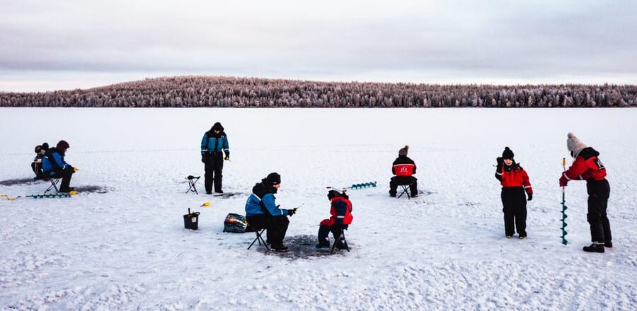Rovaniemi: Quad Bike Ride and Ice Fishing - Ice fishing on a frozen lake