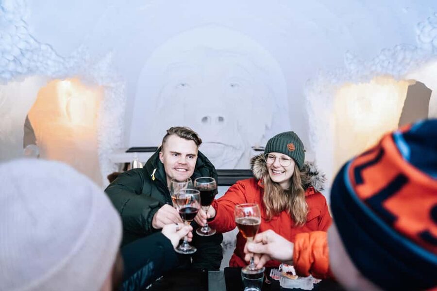 Rovaniemi: Snow Hotel Tour and Ice Restaurant Dinner - Entering a hotel made from snow and ice