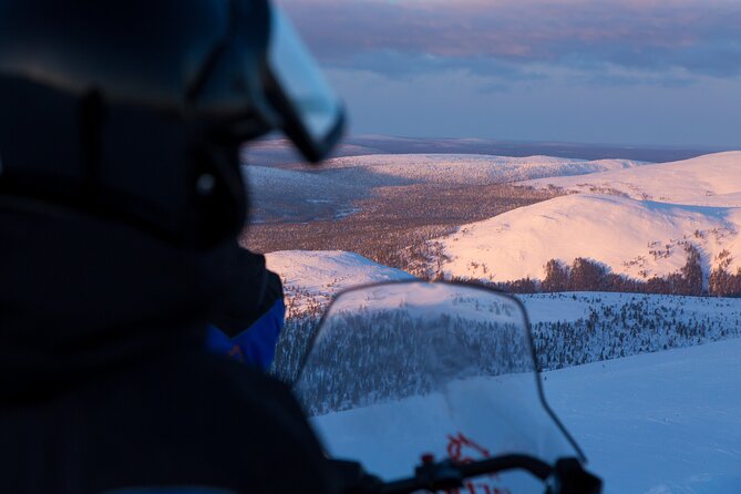 Scenic Snowmobile Safari in Saariselkä - Following the guide through forest and fells