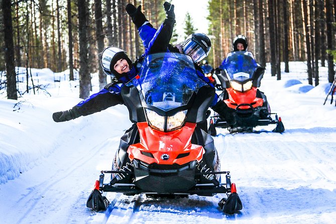Snowmobile Safari in the Nature - Morning start - Driving alone or riding two to a machine