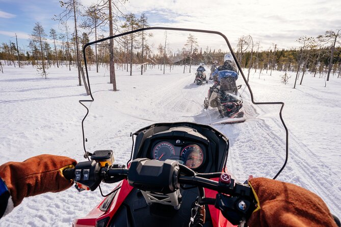 Snowmobile Safari into the Wilderness, Apukka Resort Rovaniemi - Open fields, forest trails, and the feel of the route