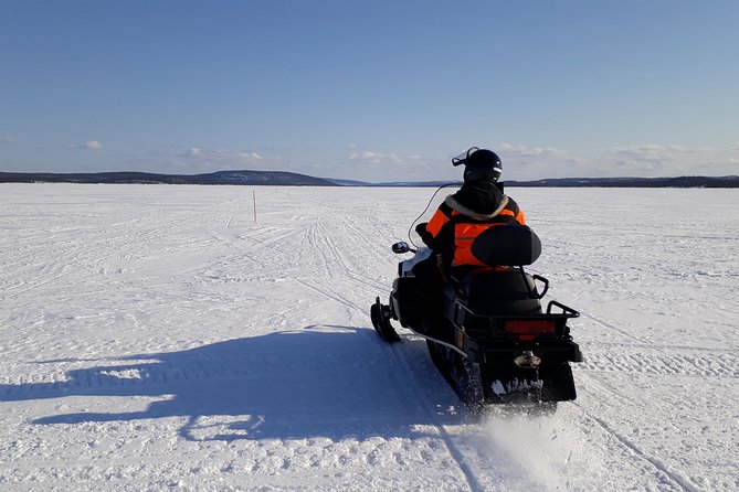 Snowmobile Safari to Lake Inari, meet & feed Reindeers, Lunch - Crossing Lake Inari by snowmobile
