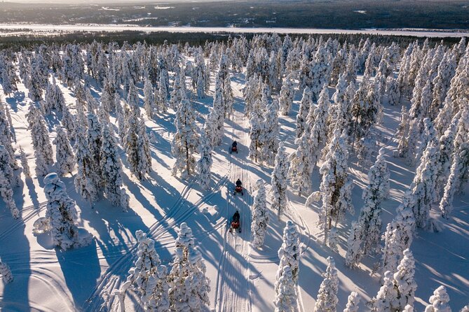 Snowmobiles and Huskies - Starting at Santa Claus Holiday Village