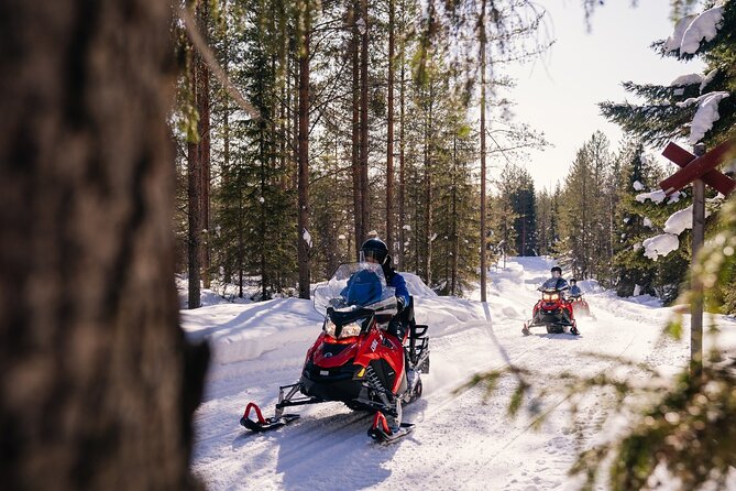 Snowmobiling and ice fishing in Apukka Resort, Rovaniemi - The frozen pond and the slower part of the trip