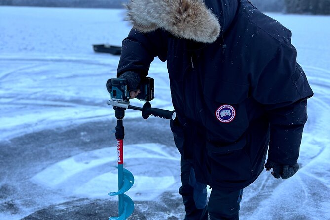 VIP Ice Fishing "ICEBREAKER" Lunch in Glass Igloo - Drilling through the ice and trying your luck